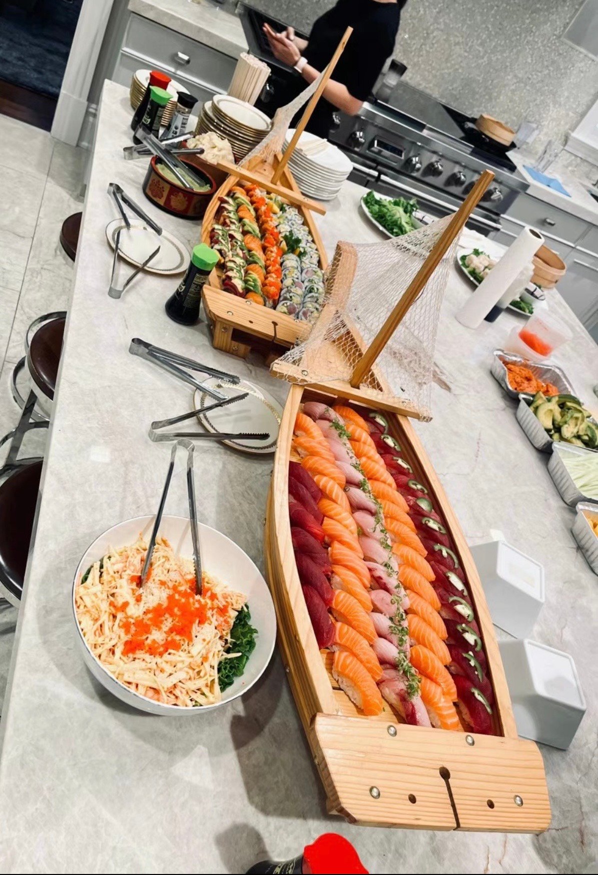 Sushi rolls and nigiri served at a private party